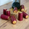 Capas com perfuração vermelhas diâmetro 31mm 100un. - 2 