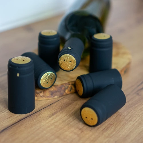 Capas com perfuração pretas fi31mm 100un. - 2
